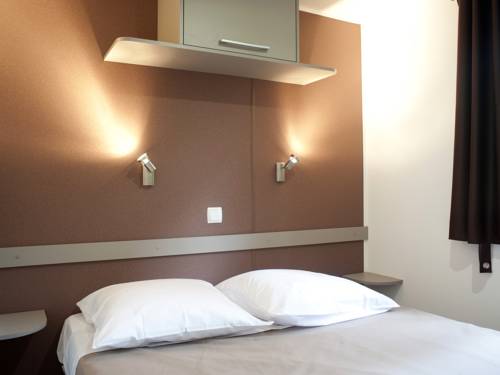 Imagen de la habitación del Hotel Huttopia Saumur. Foto 1