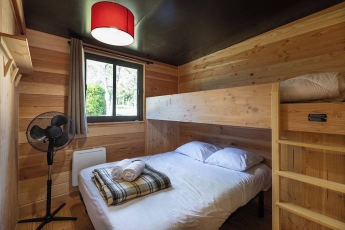 Imagen de la habitación del Hotel Huttopia Wattwiller. Foto 5