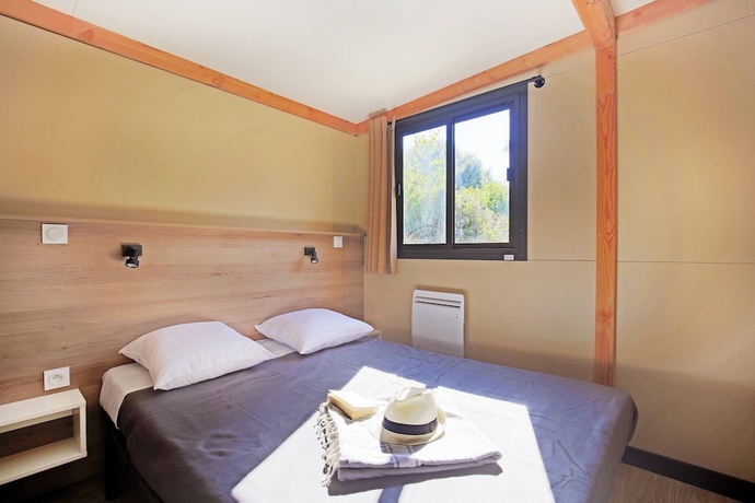 Imagen de la habitación del Hotel Huttopia Wattwiller. Foto 8