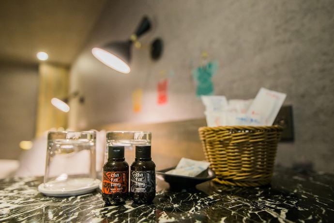 Imagen de la habitación del Hotel Huwei. Foto 6