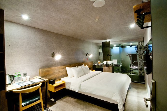 Imagen de la habitación del Hotel Huwei. Foto 8