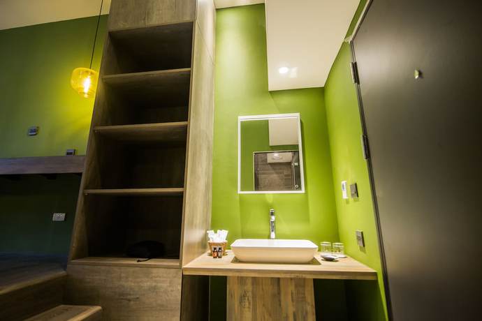 Imagen de la habitación del Hotel Huwei. Foto 11