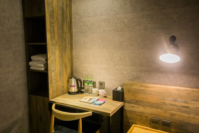 Imagen de la habitación del Hotel Huwei. Foto 12