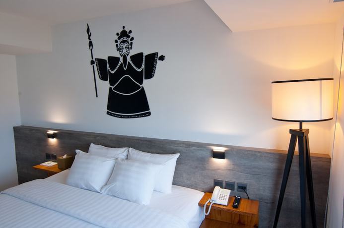 Imagen de la habitación del Hotel Huwei. Foto 13