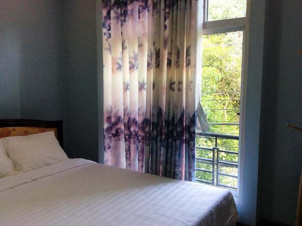 Imagen de la habitación del Hotel Huy Hoang. Foto 14