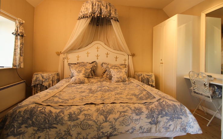 Imagen de la habitación del Hotel Hvedholm Slotshotel. Foto 5