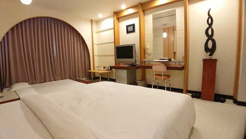 Imagen de la habitación del Hotel Hwa Nan, Tainan. Foto 3