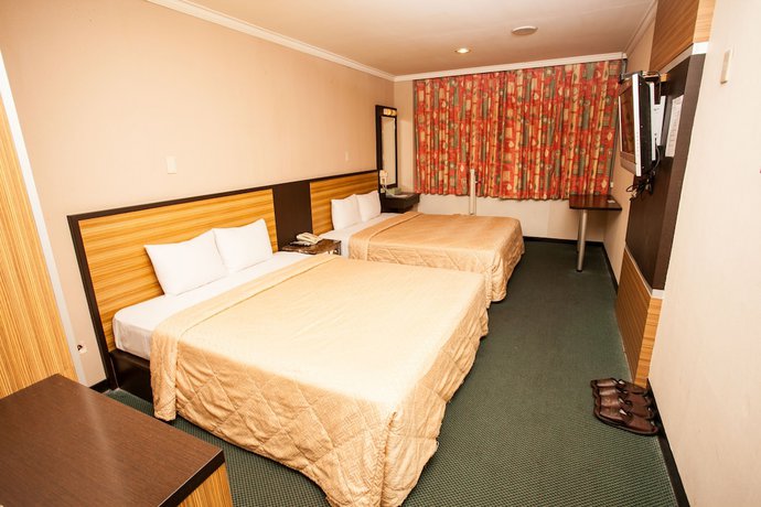 Imagen de la habitación del Hotel Hwa Nan, Tainan. Foto 4