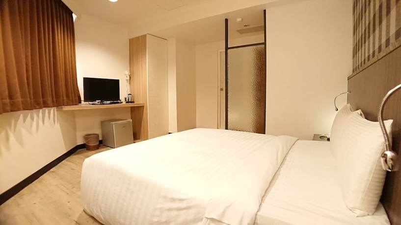 Imagen de la habitación del Hotel Hwa Nan, Tainan. Foto 8