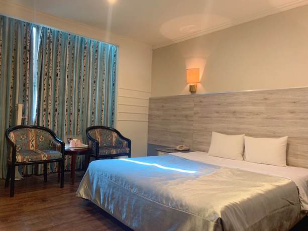 Imagen de la habitación del Hotel Hwa Nan, Tainan. Foto 14