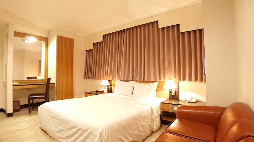 Imagen de la habitación del Hotel Hwa Nan, Tainan. Foto 16
