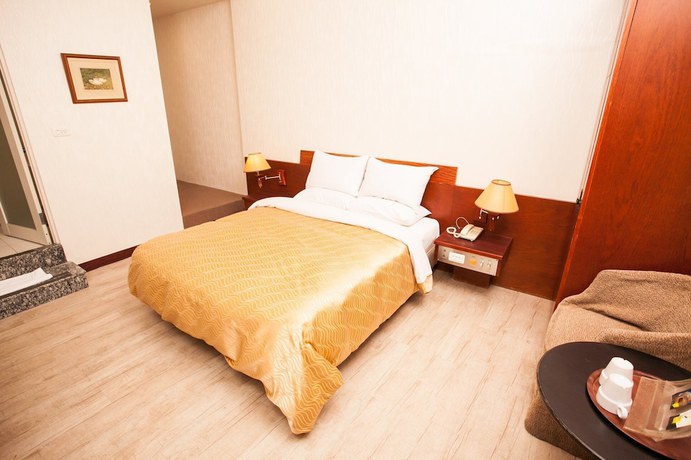 Imagen de la habitación del Hotel Hwa Nan, Tainan. Foto 18