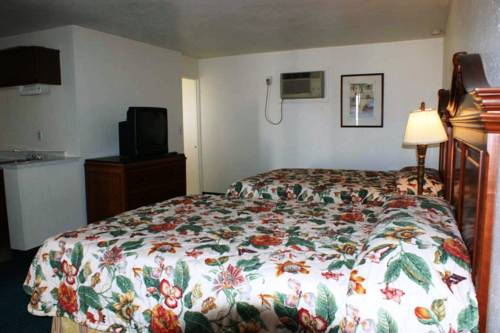 Imagen de la habitación del Hotel Hwy Express Inn and Suites. Foto 14