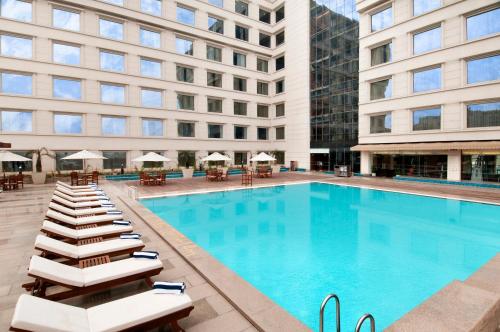 Imagen de la piscina del Hotel Hyatt Centric Janakpuri New Delhi. Foto 10