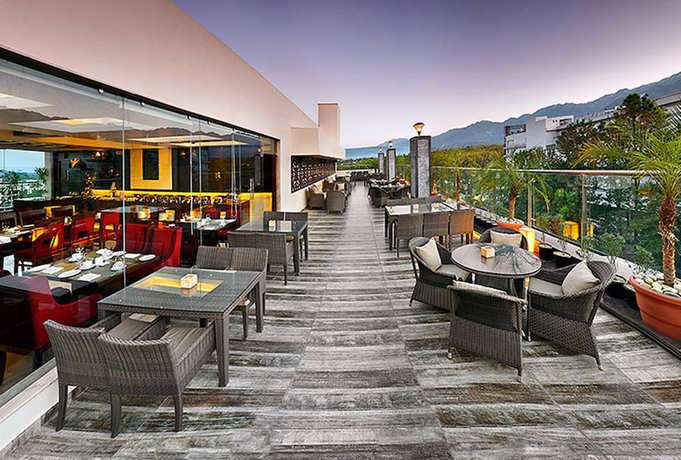 Imagen del bar/restaurante del Hotel Hyatt Centric Rajpur Road Dehradun. Foto 4