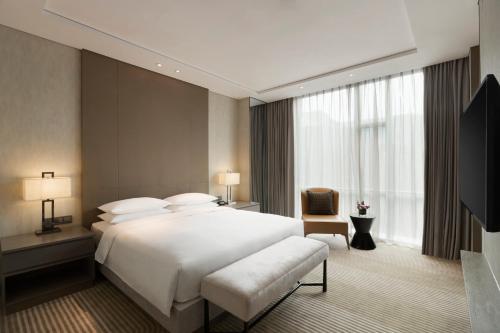 Imagen de la habitación del Hotel Hyatt House Shanghai Hongqiao Cbd. Foto 13
