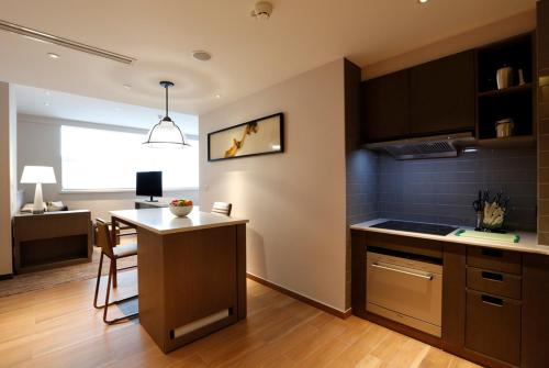 Imagen de la habitación del Hotel Hyatt House Yinchuan Yuecaicheng. Foto 7