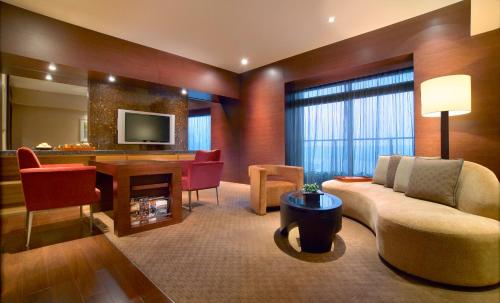 Imagen de la habitación del Hotel Hyatt On The Bund. Foto 8