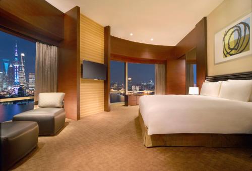 Imagen de la habitación del Hotel Hyatt On The Bund. Foto 9