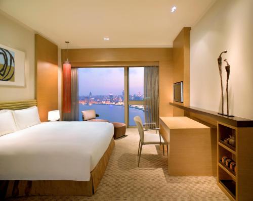 Imagen de la habitación del Hotel Hyatt On The Bund. Foto 10
