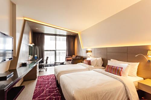 Imagen de la habitación del Hotel Hyatt Place Bangkok Sukhumvit 1. Foto 8