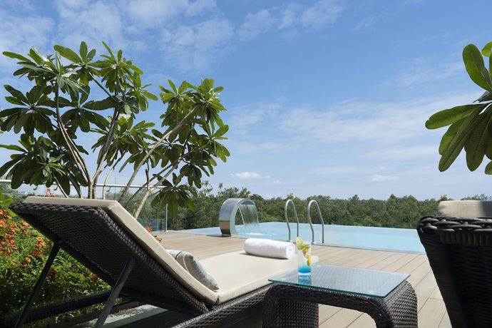 Imagen de la piscina del Hotel Hyatt Place Bharuch. Foto 19