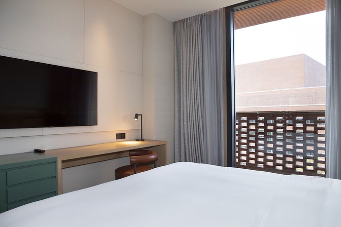 Imagen de la habitación del Hotel Hyatt Place Jingdezhen Taoxichuan. Foto 10