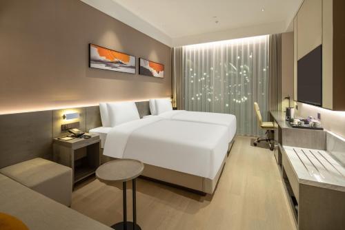 Imagen de la habitación del Hotel Hyatt Place Linyi People Square. Foto 16