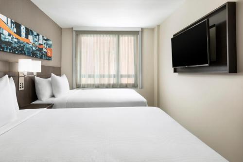 Imagen de la habitación del Hotel Hyatt Place New York City/Time Square. Foto 14