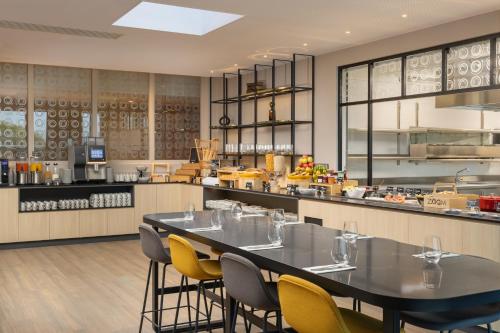 Imagen del bar/restaurante del Hotel Hyatt Place Rouen. Foto 10