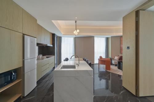 Imagen de la habitación del Hotel Hyatt Place Yantai Development Zone. Foto 5