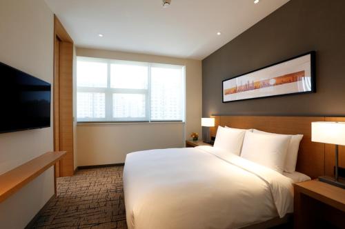 Imagen de la habitación del Hotel Hyatt Place Yinchuan Yuecaicheng. Foto 8