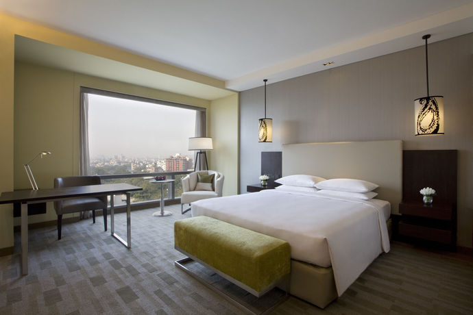 Imagen de la habitación del Hotel Hyatt Regency Ahmedabad. Foto 10