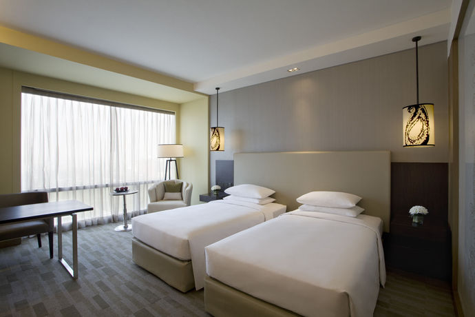 Imagen de la habitación del Hotel Hyatt Regency Ahmedabad. Foto 12