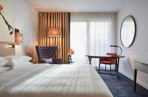 Imagen de la habitación del Hotel Hyatt Regency Amsterdam. Foto 8