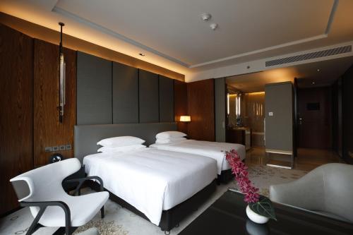 Imagen de la habitación del Hotel Hyatt Regency Bangkok Sukhumvit. Foto 10