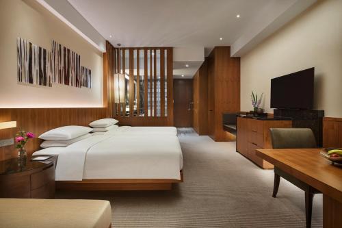 Imagen de la habitación del Hotel Hyatt Regency Changchun. Foto 8
