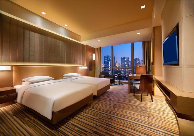 Imagen de la habitación del Hotel Hyatt Regency Chongqing. Foto 7