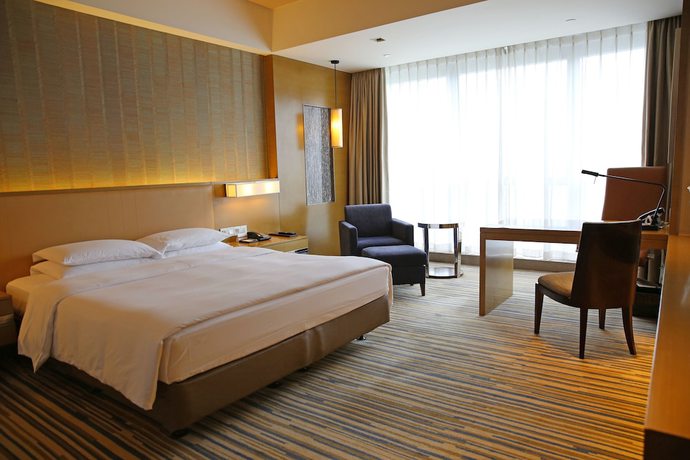 Imagen de la habitación del Hotel Hyatt Regency Chongqing. Foto 3