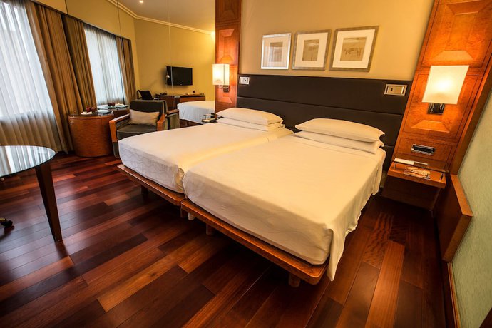 Imagen de la habitación del Hotel Hyatt Regency Delhi. Foto 11