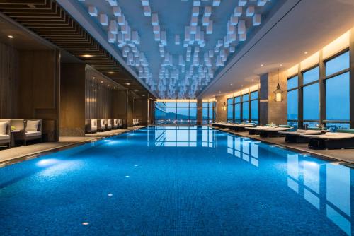 Imagen de la piscina del Hotel Hyatt Regency Fuzhou Cangshan. Foto 10