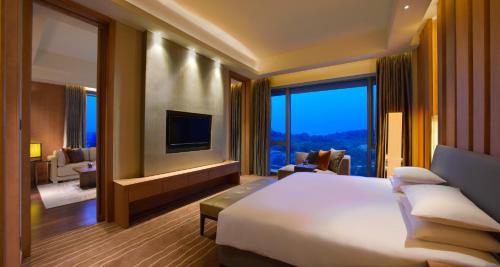 Imagen de la habitación del Hotel Hyatt Regency Guiyang. Foto 14
