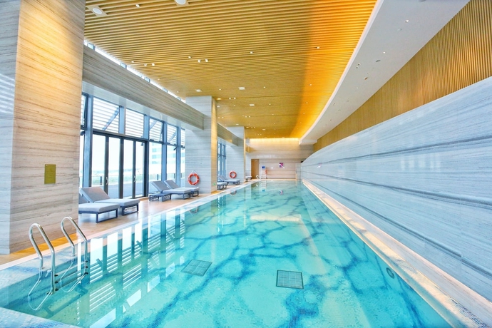 Imagen de la piscina del Hotel Hyatt Regency Hengqin. Foto 19