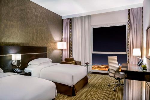 Imagen de la habitación del Hotel Hyatt Regency Oryx Doha. Foto 14