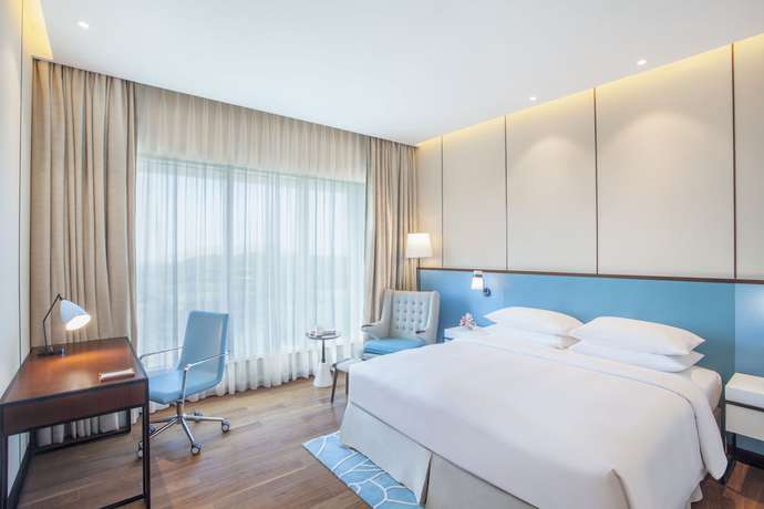 Imagen de la habitación del Hotel Hyatt Regency Thrissur. Foto 8