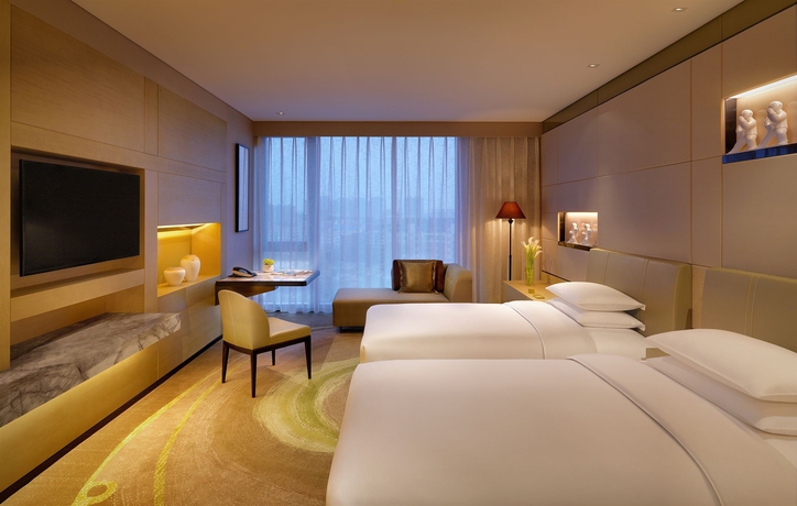 Imagen de la habitación del Hotel Hyatt Regency Tianjin East. Foto 8