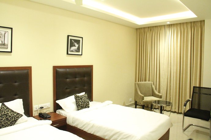 Imagen de la habitación del Hotel Hyderabad Grand. Foto 9