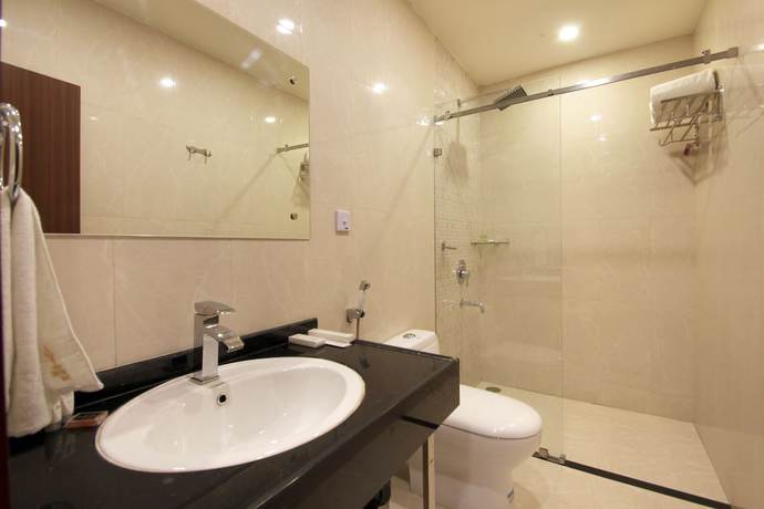 Imagen de la habitación del Hotel Hyderabad Grand. Foto 15