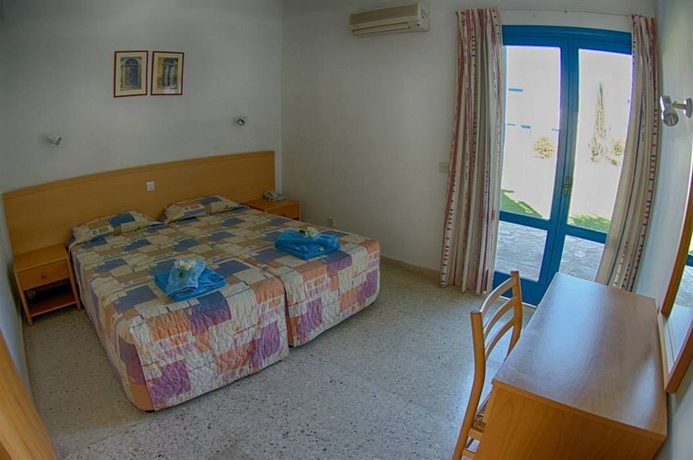 Imagen de la habitación del Hotel Hylatio Tourist Village. Foto 6