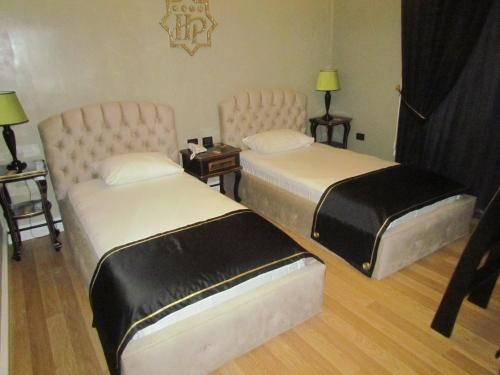 Imagen de la habitación del Hotel Hymetis Palace. Foto 8